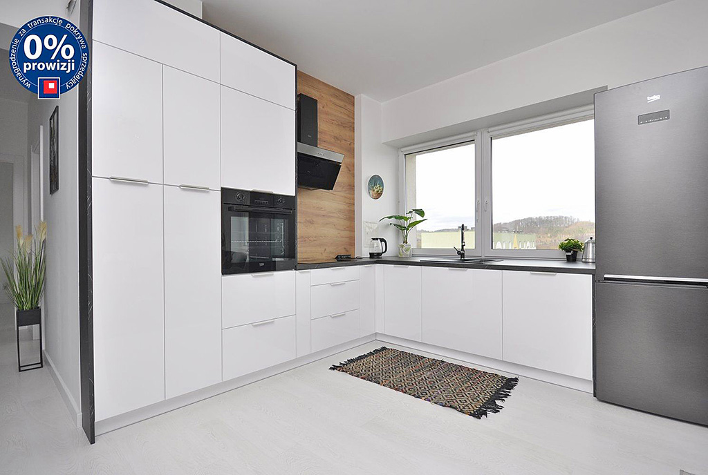 funkcjonalnie urządzona kuchnia w luksusowym apartamencie na sprzedaż Gdynia (okolice)