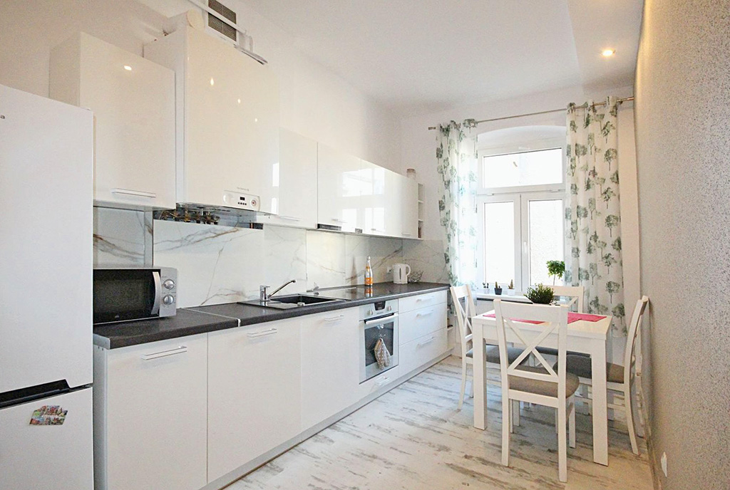funkcjonalnie urządzona kuchnia w luksusowym apartamencie do sprzedaży Szczecin