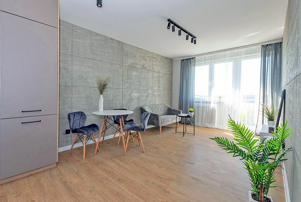 nowoczesny salon w ekskluzywnym apartamencie do sprzedaży Elbląg