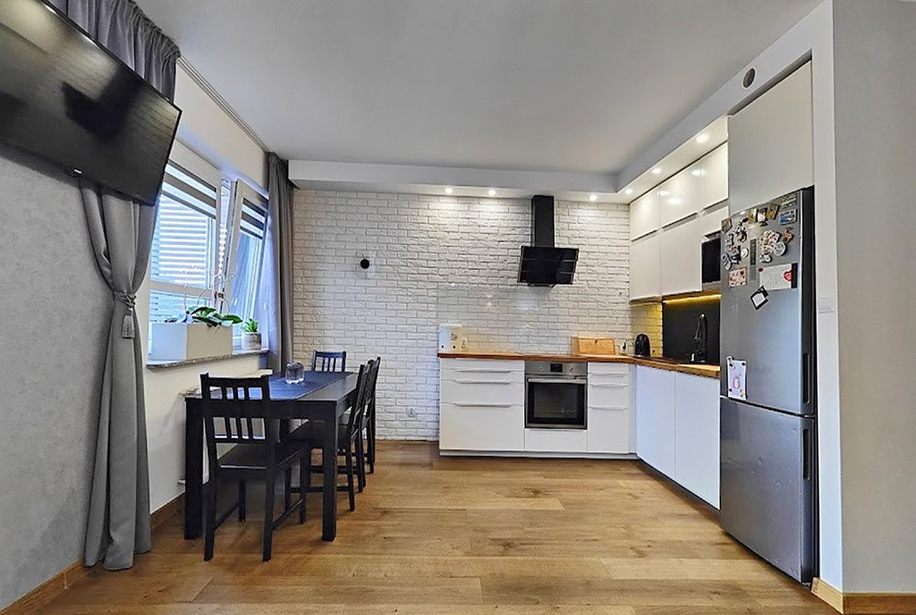 widok na kuchnię w luksusowym apartamencie na sprzedaż Ełk