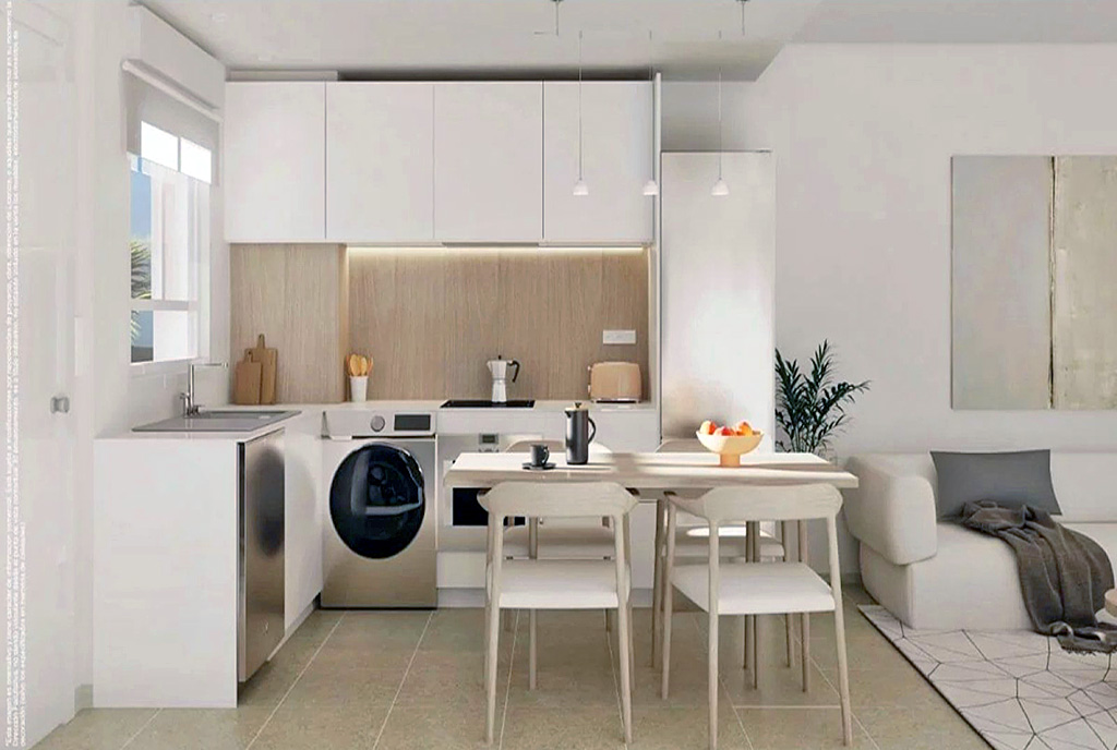 na zdjęciu jadalnia oraz kuchnia w luksusowym apartamencie na sprzedaż Hiszpania (Mijas)
