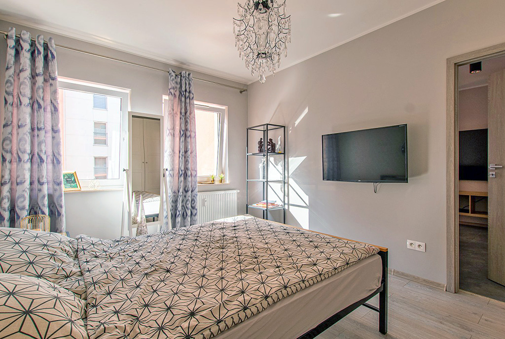 fragment sypialni w ekskluzywnym apartamencie na sprzedaż Poznań