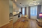 nowoczesny pokój dzienny w ekskluzywnym apartamencie do sprzedaży Wrocław
