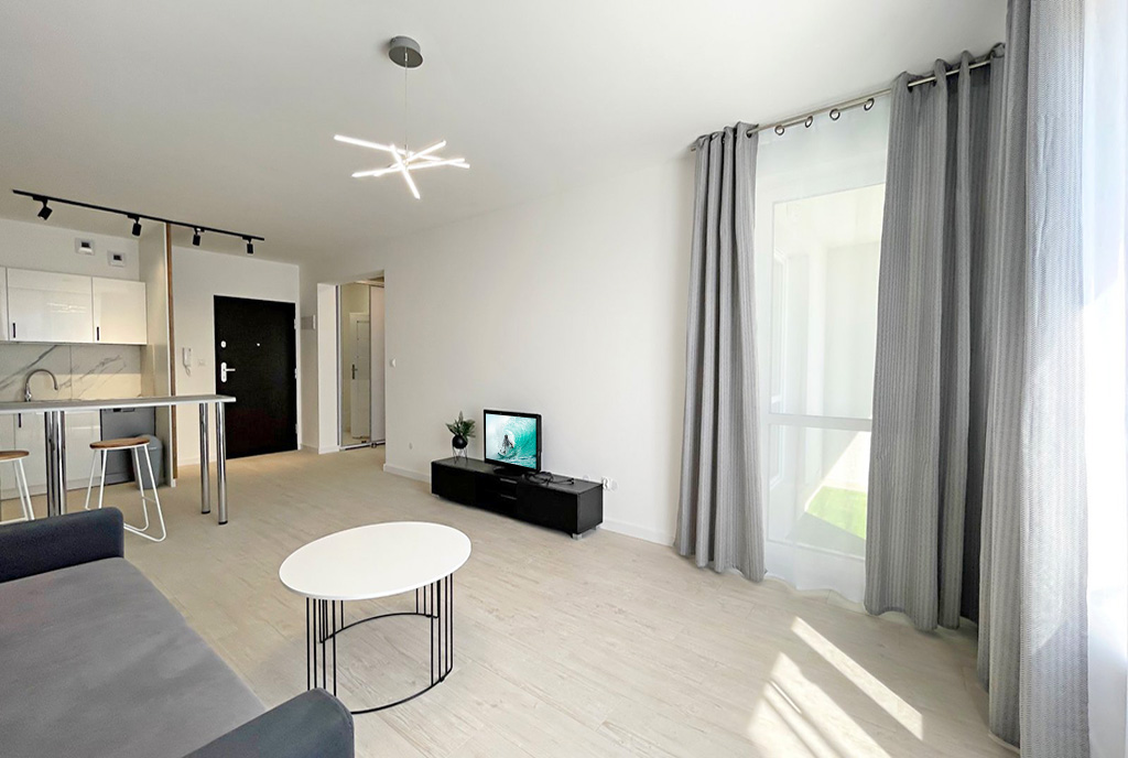 druga strona pokoju dziennego w luksusowym apartamencie do wynajmu Gorzów Wielkopolski