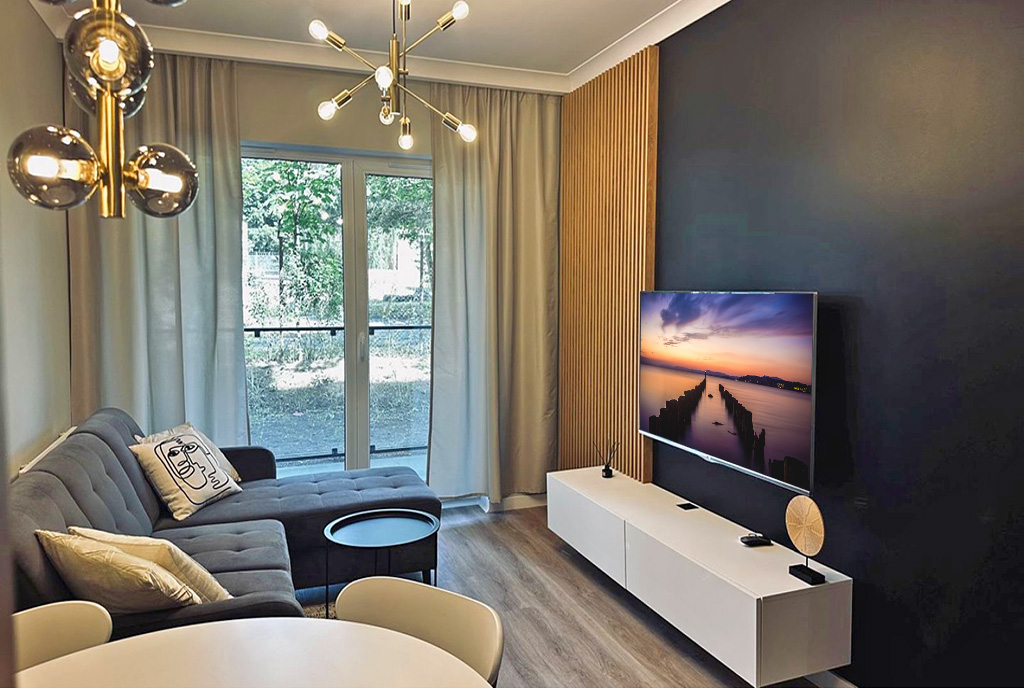 nowoczesny pokój gościnny w ekskluzywnym apartamencie do wynajęcia Słupsk