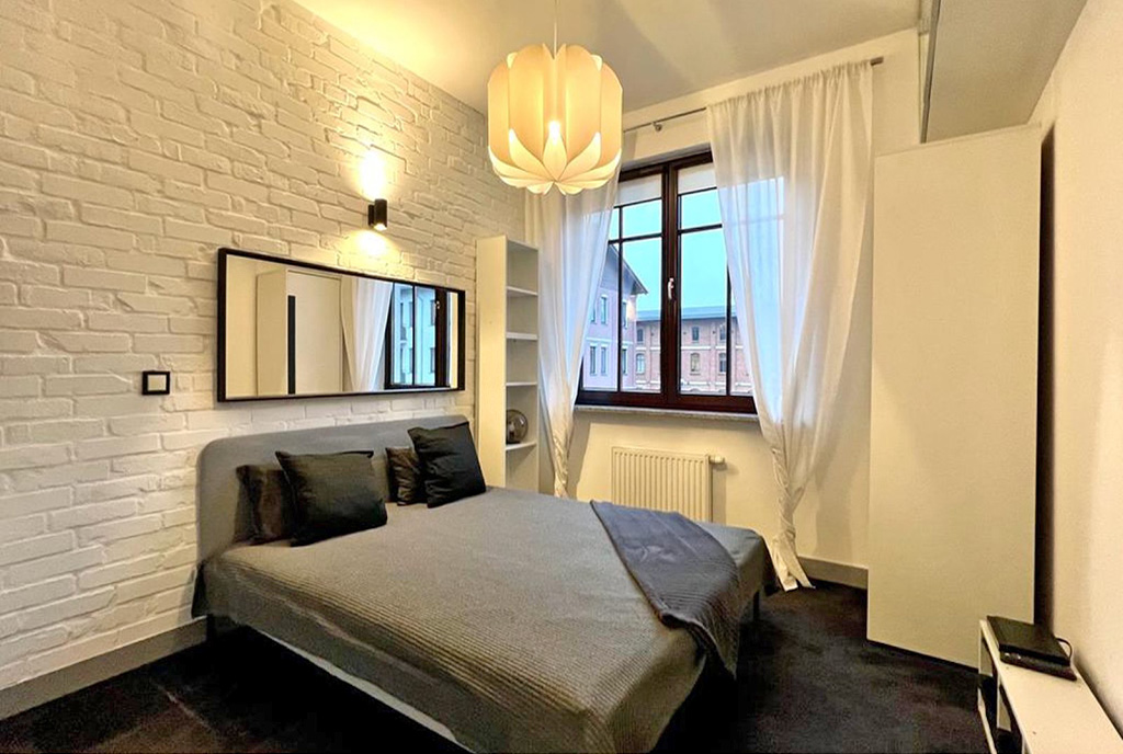 elegancka sypialnia w ekskluzywnym apartamencie na wynajem Szczecin