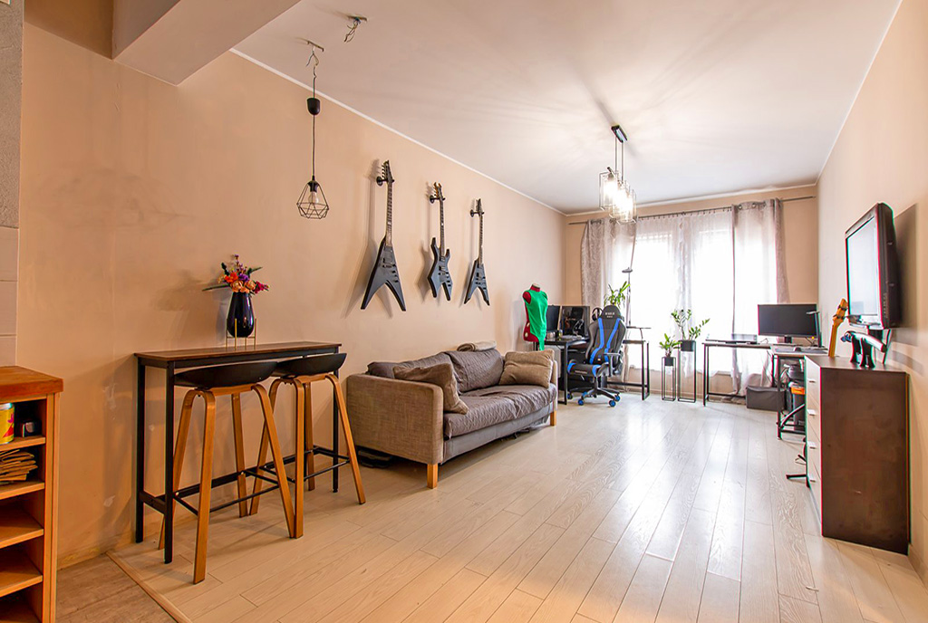 imponujący salon w ekskluzywnym apartamencie do sprzedaży Poznań