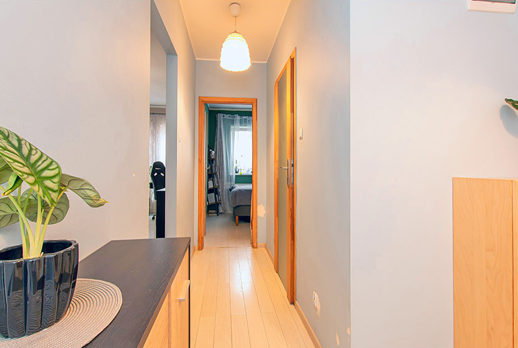 imponujący przedpokój w ekskluzywnym apartamencie na sprzedaż Poznań