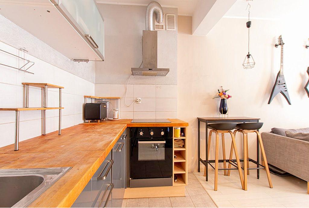 modnie zaaranżowana kuchnia w luksusowym apartamencie na sprzedaż Poznań