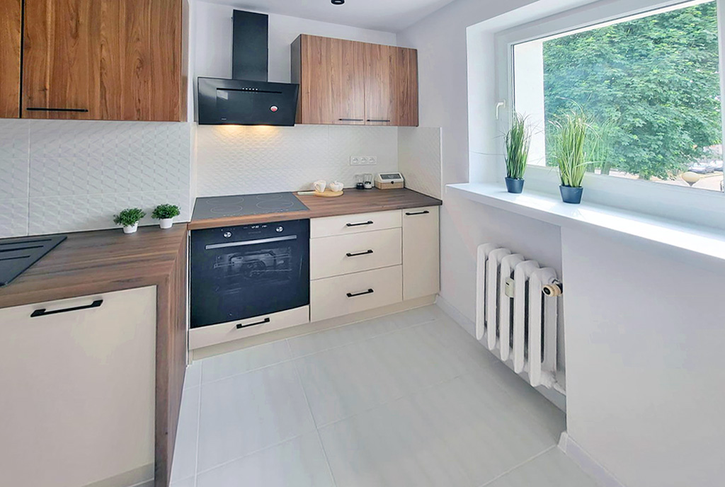 funkcjonalnie zaaranżowana kuchnia w ekskluzywnym apartamencie na sprzedaż Ostrów Wielkopolski