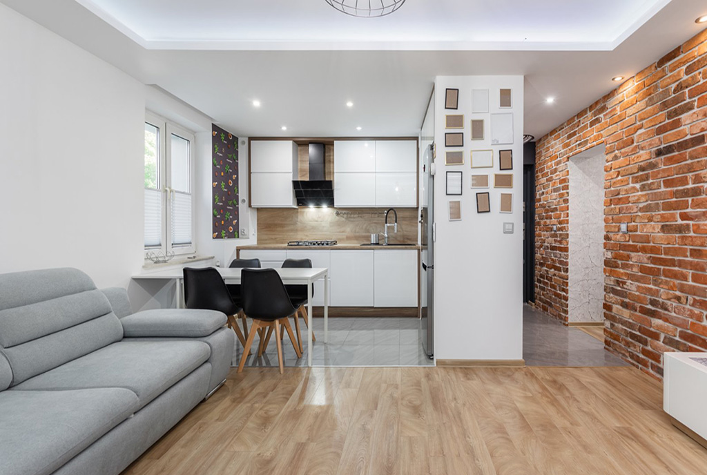 pokój dzienny i aneks kuchenny w luksusowym apartamencie do sprzedaży Szczecin