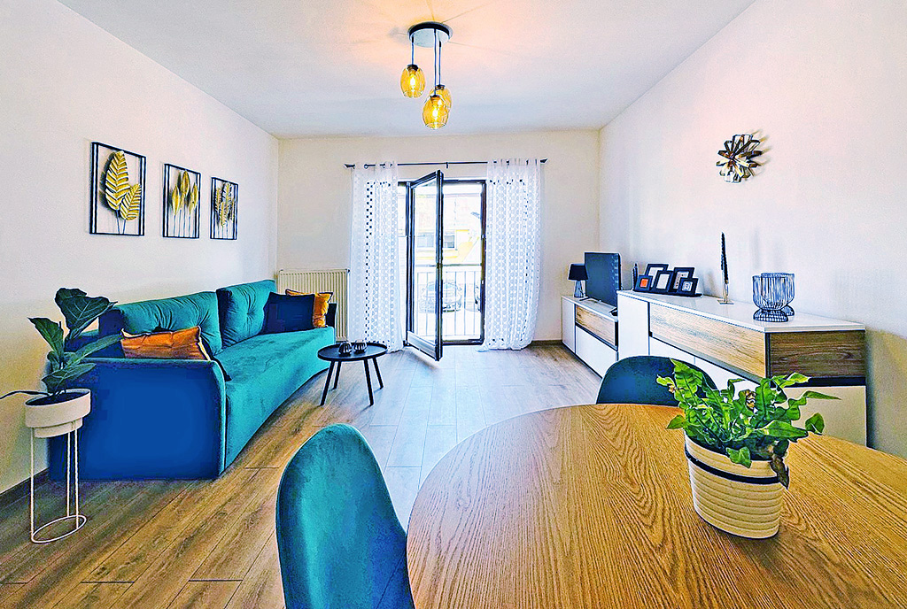 słoneczny salon w ekskluzywnym apartamencie do wynajęcia Słupsk