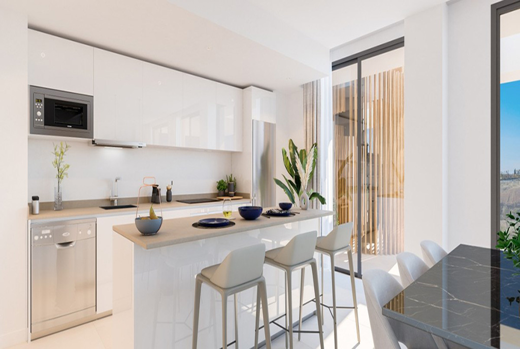 jadalnia oraz kuchnia w ekskluzywnym apartamencie na sprzedaż Hiszpania (Fuengirola)
