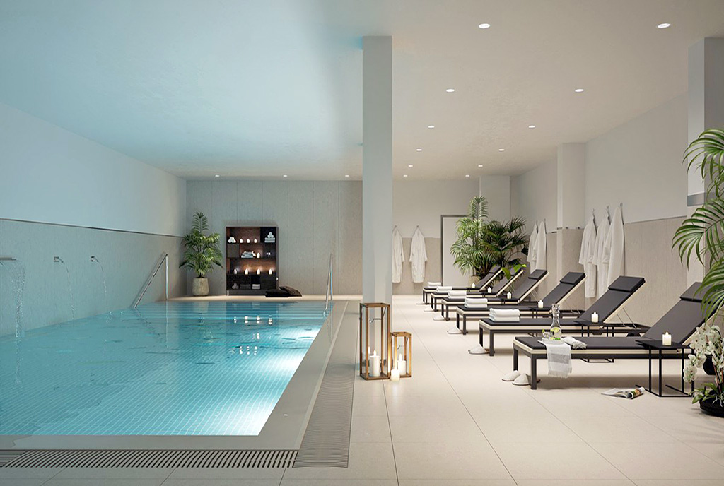 basen w częściach wspólnych apartamentowca, gdzie znajduje się oferowany na sprzedaż luksusowy apartament Hiszpania (Mijas Costa)