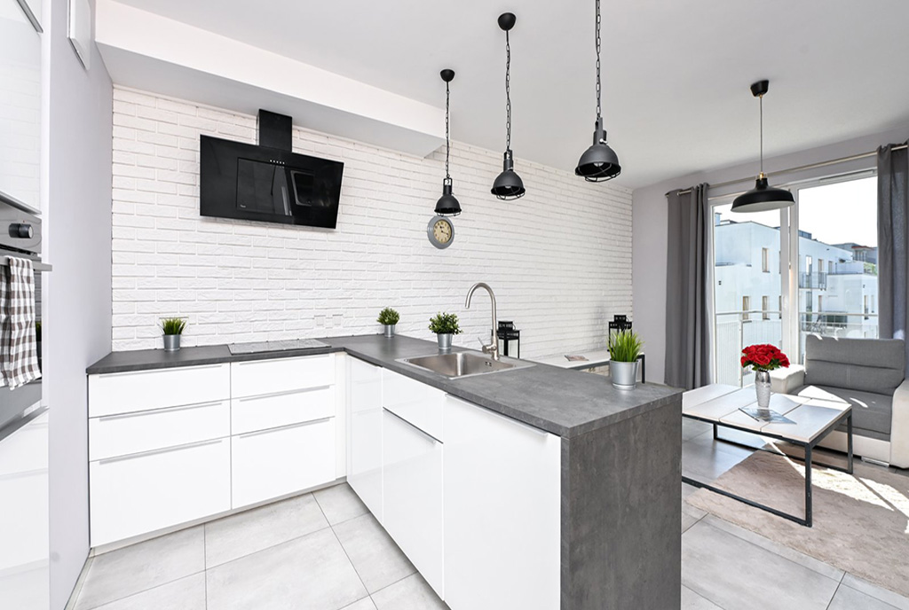 zaprojektowana w nowoczesnym designie kuchnia w ekskluzywnym apartamencie do wynajęcia Warszawa