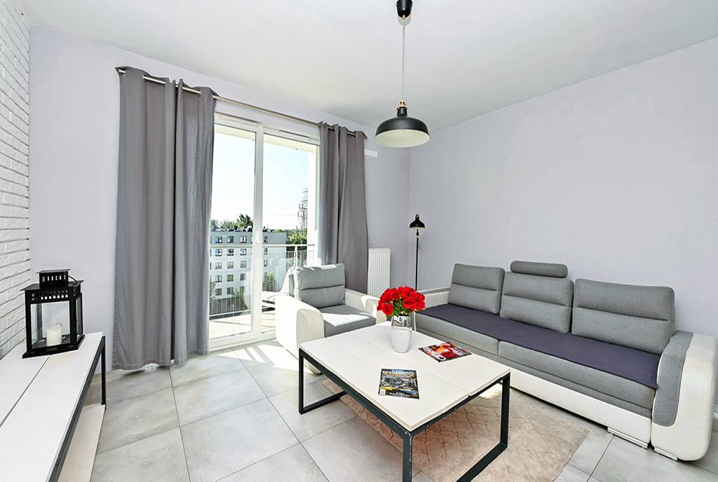 elegancki pokój dzienny w luksusowym apartamencie do wynajmu Warszawa