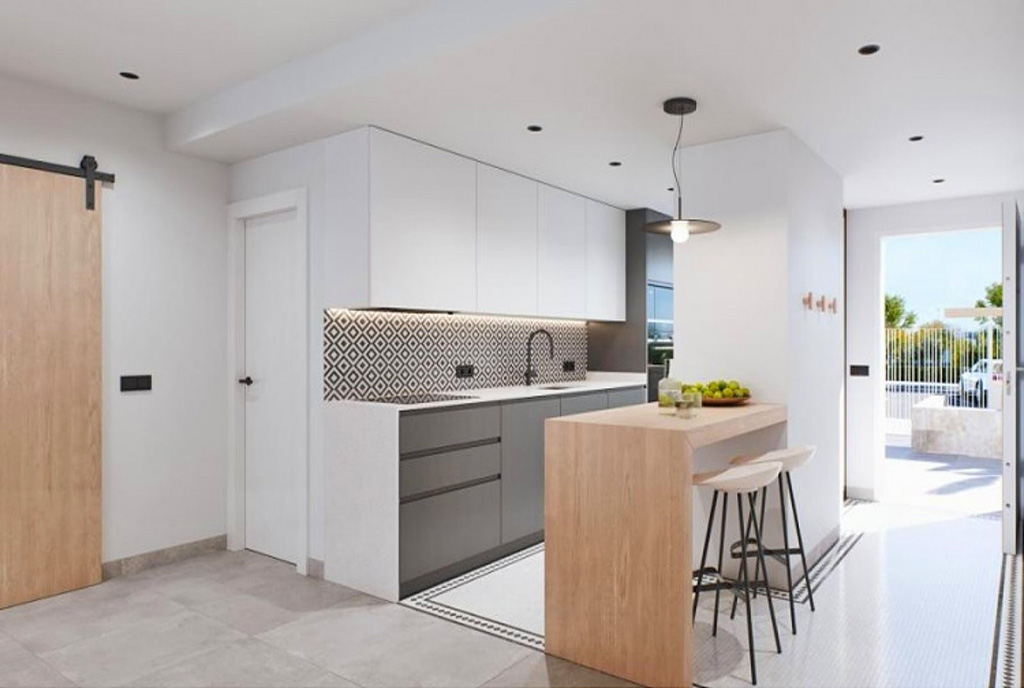 jadalnia oraz kuchnia w ekskluzywnym apartamencie na sprzedaż Hiszpania (Pilar De La Horadada)