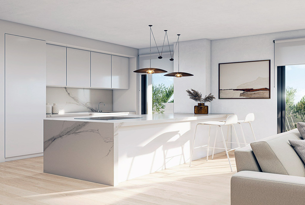 zaprojektowana w bieli kuchnia w luksusowym apartamencie na sprzedaż Hiszpania (Torremolinos)