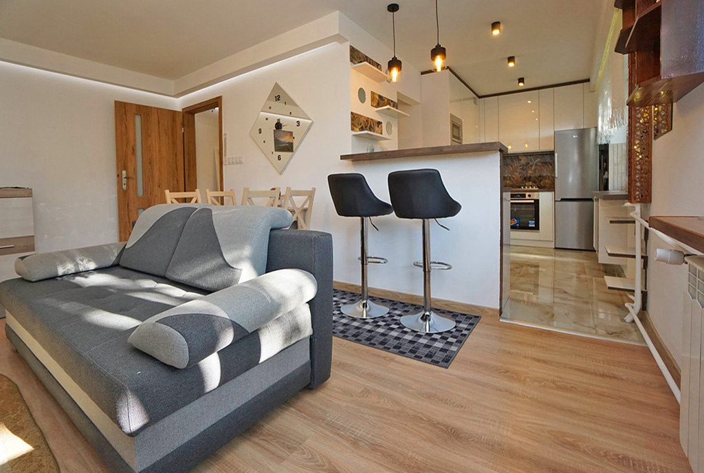 pokój gościnny i kuchnia w luksusowym apartamencie do wynajmu Piotrków Trybunalski