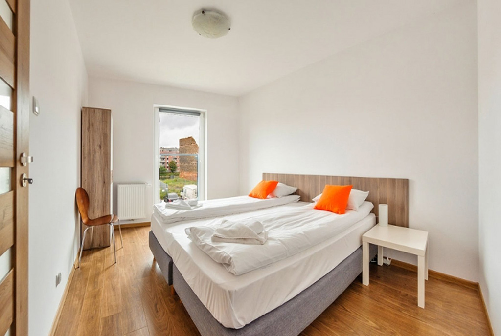 elegancka sypialnia w ekskluzywnym apartamencie na wynajem Gdańsk