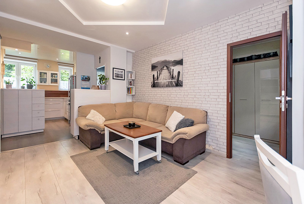 nowoczesny salon w ekskluzywnym apartamencie do sprzedaży Elbląg
