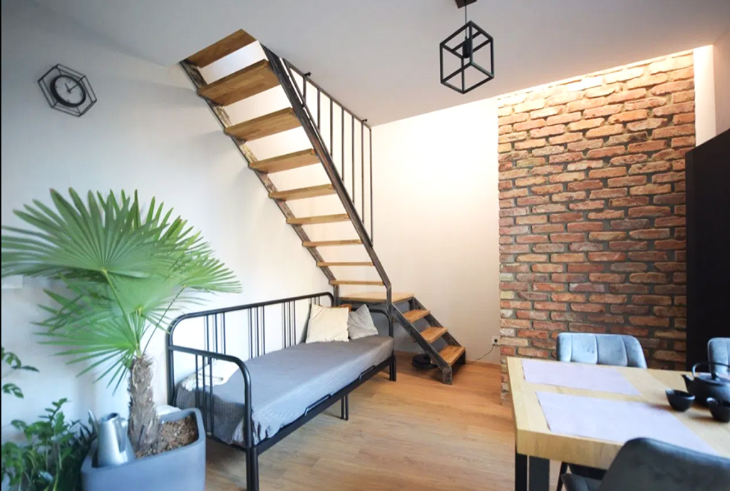 widok na oba poziomy luksusowego apartamentu na sprzedaż Gdańsk
