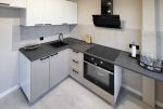 zabudowana kuchnia w ekskluzywnym, apartamencie na sprzedaż apartamenty do sprzedaży, apartamenty na sprzedaż, apartamenty Kalisz sprzedaż