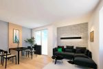 widok z pokoju dziennego na taras przy luksusowym apartamencie na sprzedaż Kalisz