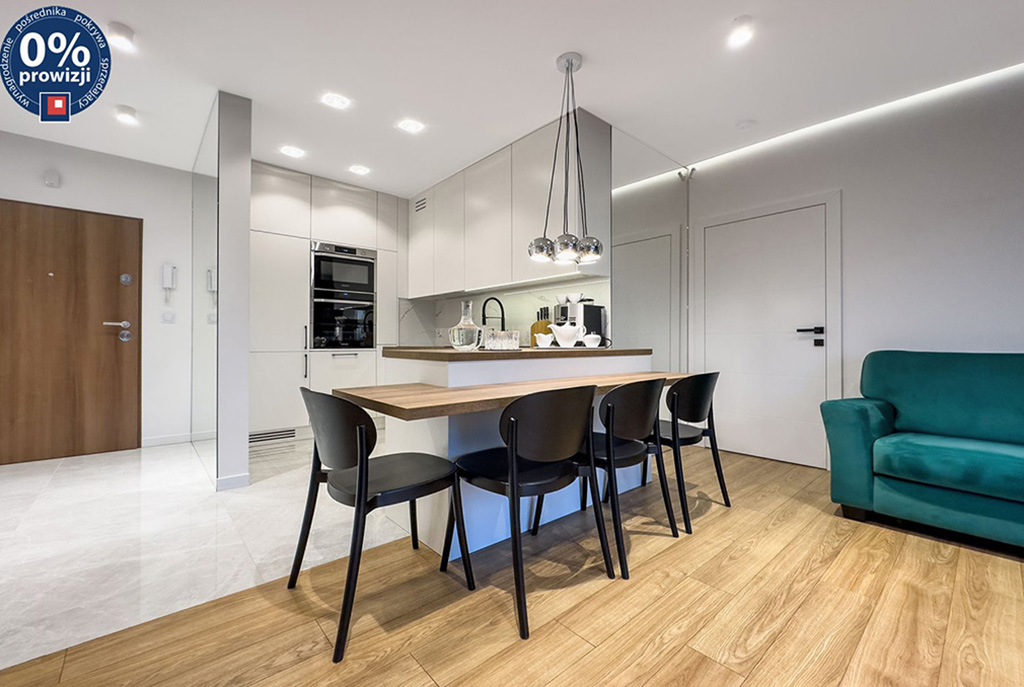 na pierwszym planie jadalna w luksusowym apartamencie na sprzedaż Katowice (okolice)