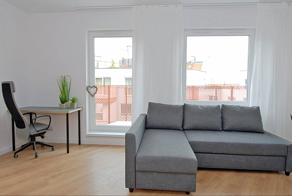 minimalistyczny wystrój ekskluzywnego apartamentu do wynajęcia Poznań