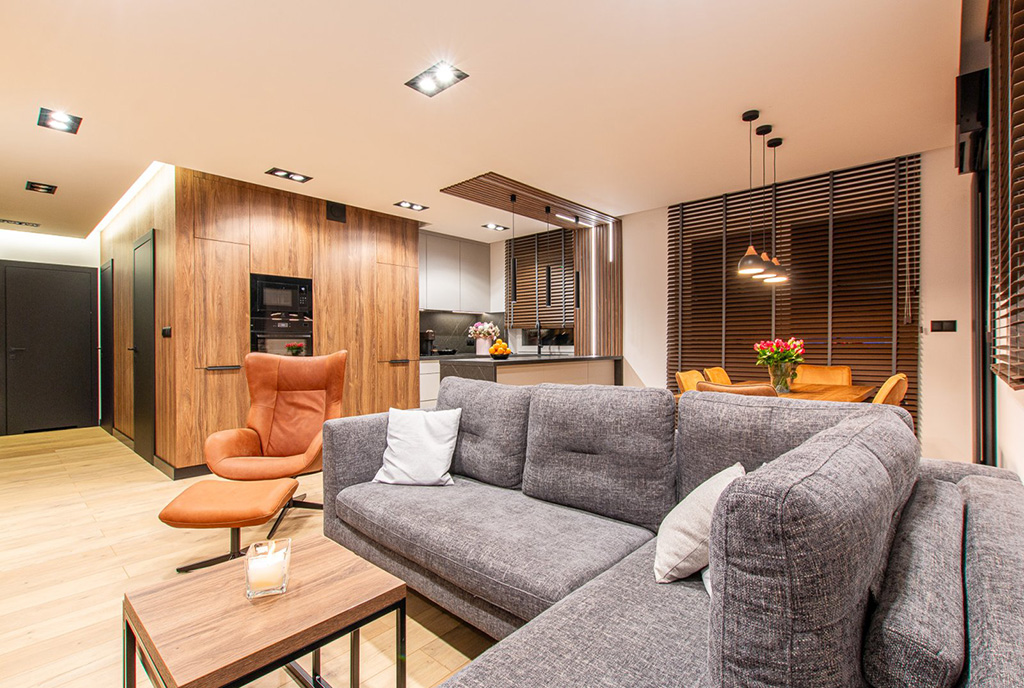 imponujący salon w luksusowym apartamencie do wynajmu Poznań