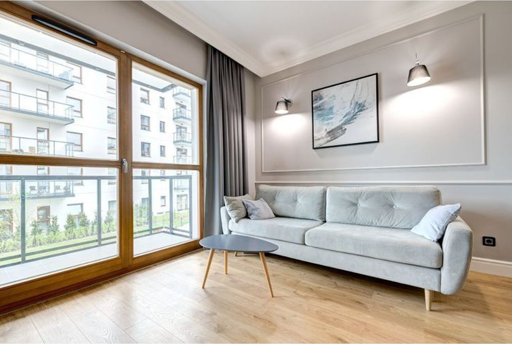 druga strona pokoju dziennego w luksusowym apartamencie na sprzedaż Gdańsk