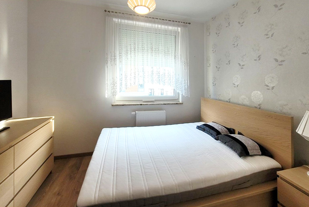 zaciszna sypialnia w ekskluzywnym apartamencie na sprzedaż Wrocław