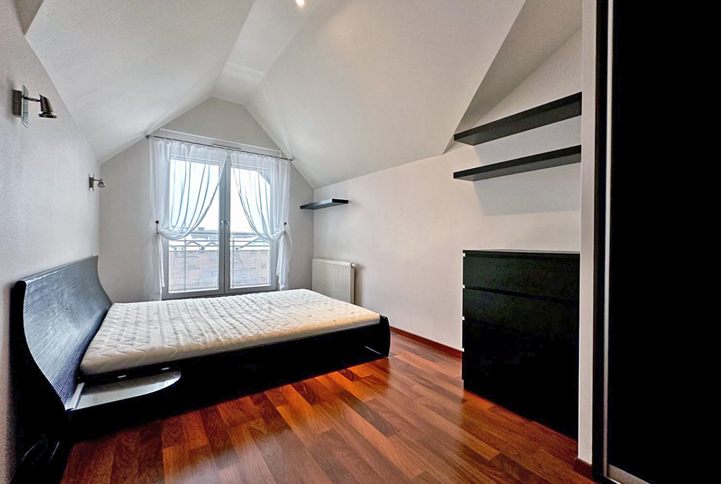 elegancka sypialnia w ekskluzywnym apartamencie na sprzedaż Wrocław