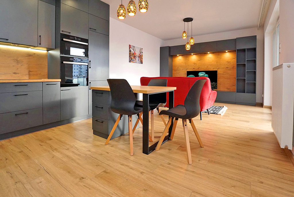 efektownie oświetlone wnętrze ekskluzywnego apartamentu do wynajęcia Piotrków Trybunalski