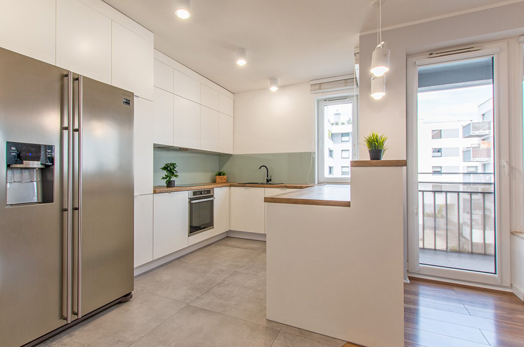 zabudowana kuchnia w ekskluzywnym apartamencie na wynajem Poznań