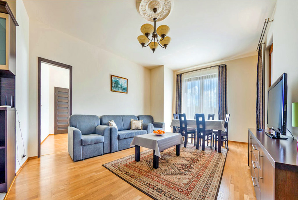 elegancki pokój gościnny w ekskluzywnym apartamencie do sprzedaży Kołobrzeg