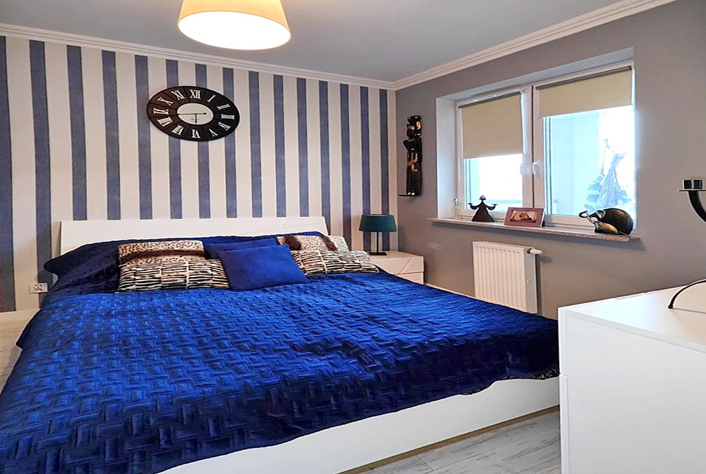 elegancka sypialnia w ekskluzywnym apartamencie na sprzedaż Ełk