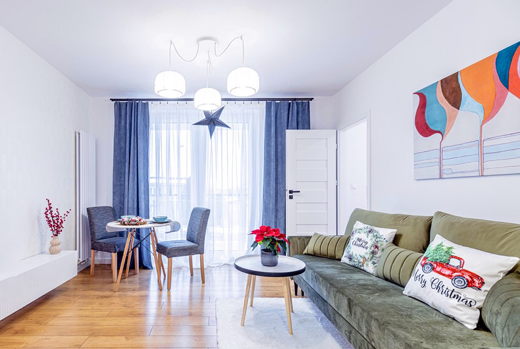 eleganckie wnętrze pokoju dziennego w luksusowym apartamencie do sprzedaży Kalisz