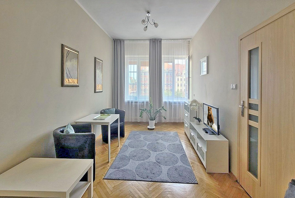 stylowy pokój dzienny w ekskluzywnym apartamencie do wynajęcia Wrocław