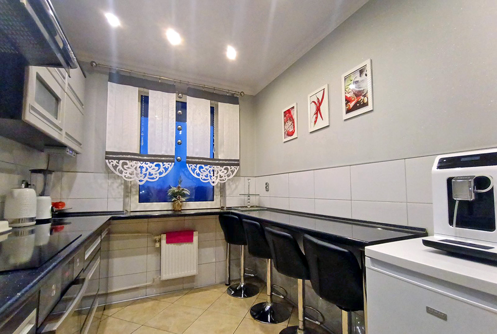 nowoczesna zabudowa kuchni w luksusowym apartamencie na sprzedaż Katowice (okolice)