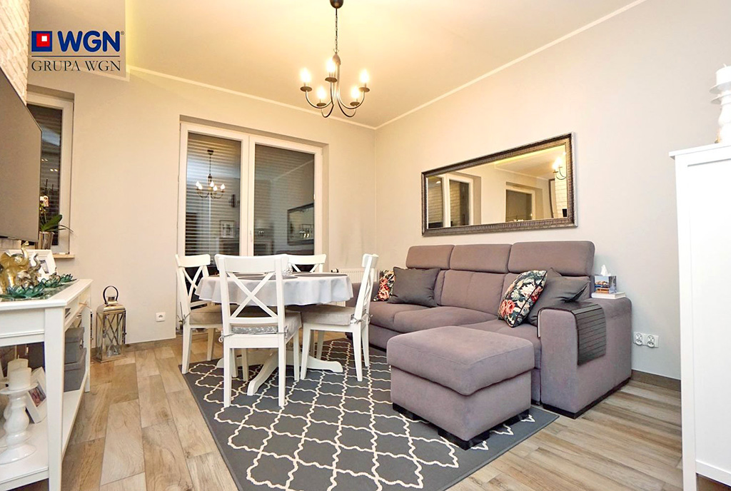 inna perspektywa pokoju dziennego w luksusowym apartamencie na sprzedaż Konin