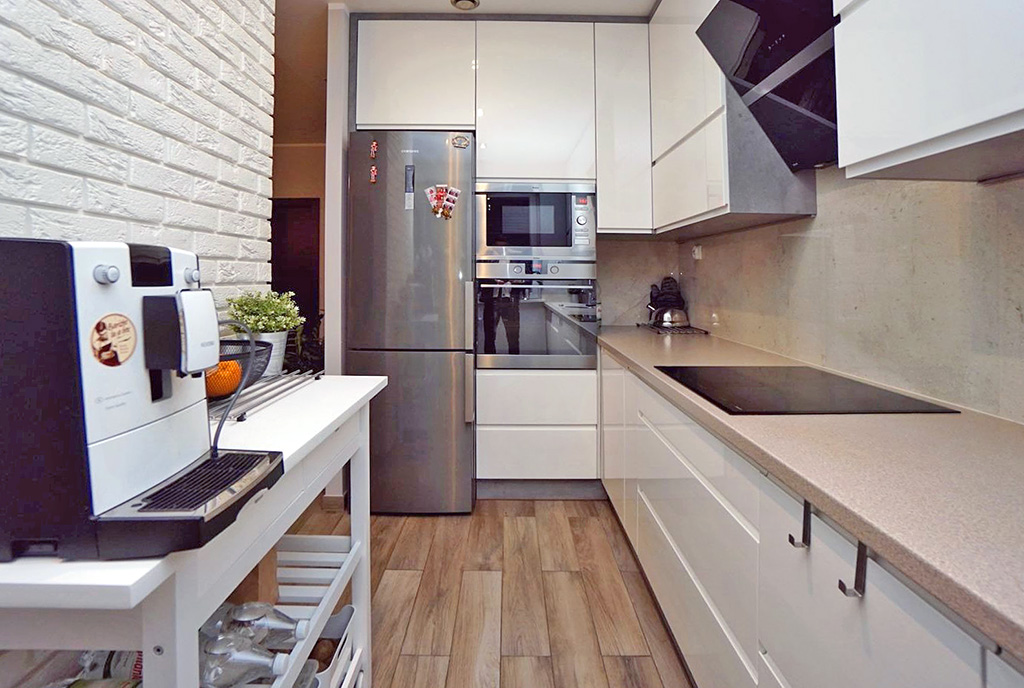zaprojektowana zgodnie z najnowszymi trendami kuchnia w ekskluzywnym apartamencie na sprzedaż Konin