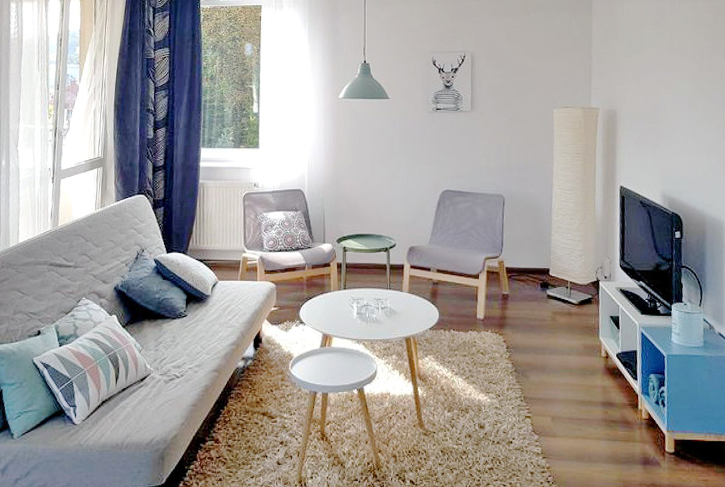 imponująca perspektywa salonu w ekskluzywnym apartamencie na sprzedaż Gdańsk