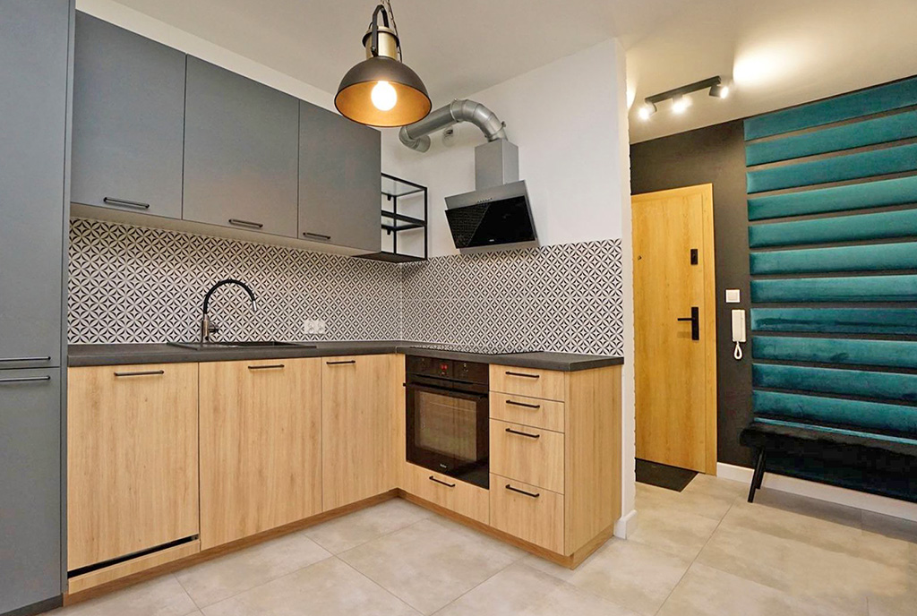 nowocześnie zaaranżowana kuchnia w luksusowym apartamencie do wynajmu Konin