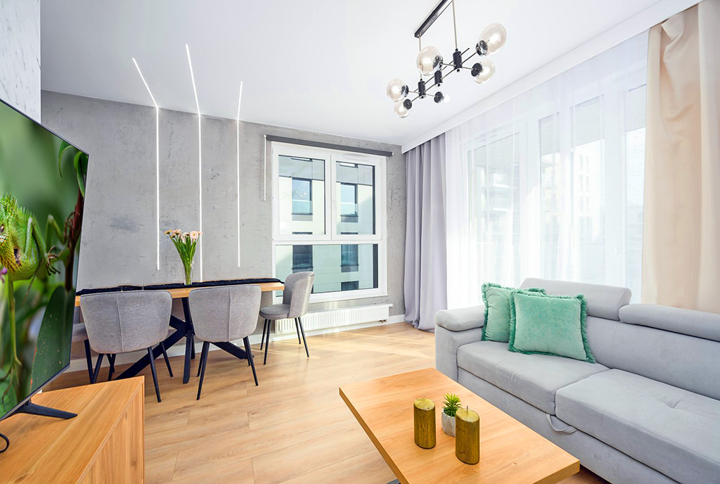 imponujący pokój dzienny w ekskluzywnym apartamencie do sprzedaży Gdańsk