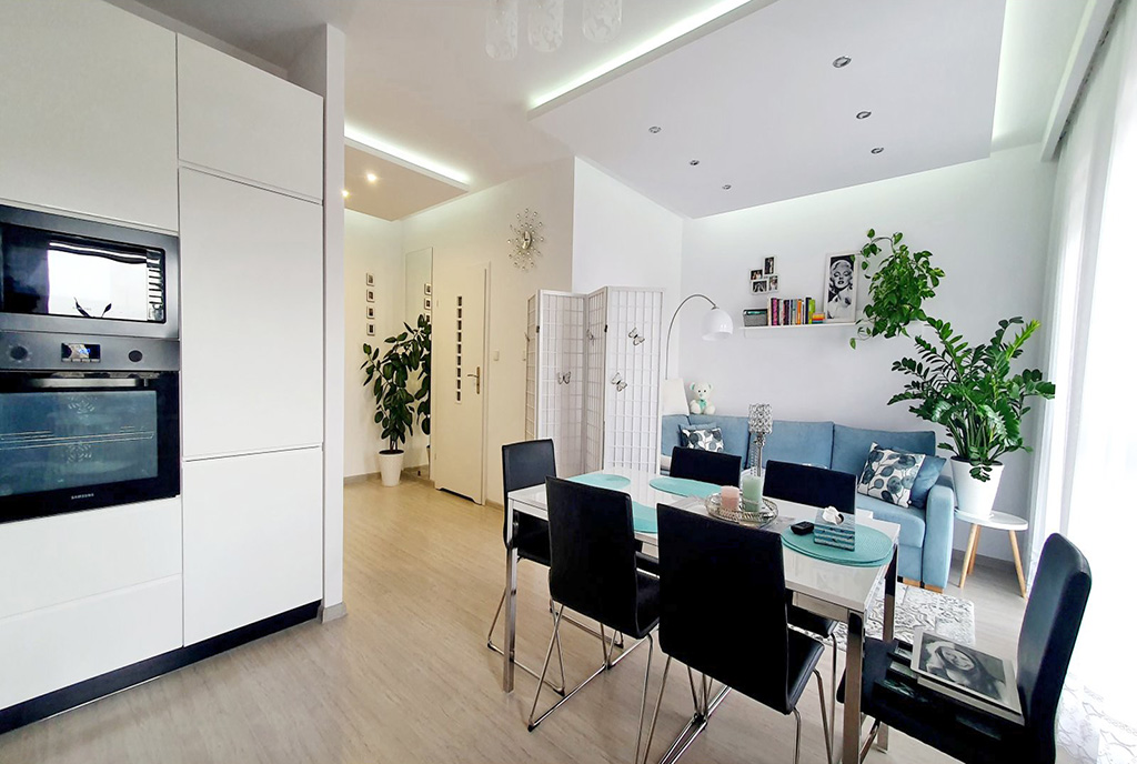 futurystyczna kuchnia i jadalnia w luksusowym apartamencie na sprzedaż Toruń (okolice)