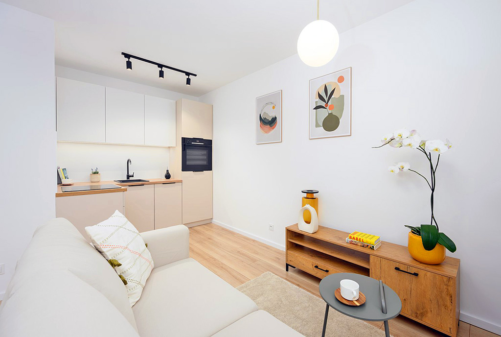 widok z salonu na aneks kuchenny w luksusowym apartamencie na sprzedaż Gdańsk