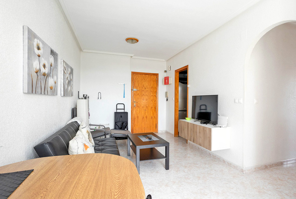 przeciwległa ściana pokoju dziennego w luksusowym apartamencie na sprzedaż Hiszpania (Torrevieja)