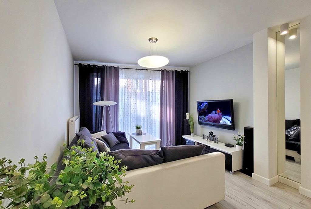 elegancki pokój dzienny w ekskluzywnym apartamencie do sprzedaży Kalisz